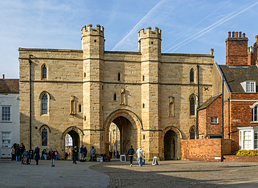 Sun shining on Exchequer Gate, Minster Yard, city of Lincoln, Lincolnshire, England, UK