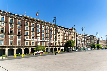 Historic buildings on west side of main city square, Plaza de la Constitucion, Monte de Piedad, Mexico City, Mexico, North America