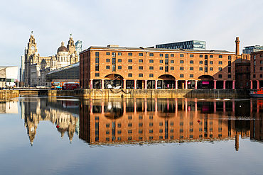 View to the Three Graces from Royal Albert Dock, Pier Head, Liverpool, England, UK
