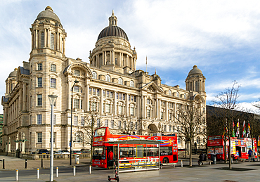 Port of LIverpool building, Pier Head, Liverpool, England, UK completed 1907 architect Sir Arnold Thornely red double-decker tour bus