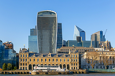Historic architecture Old Billingsgate fish market building contrast with modern skyscrapers, River Thames, City of London, England, UK