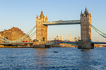 Tower Bridge in sunshine at dusk, River Thames from Southwark, London, England, UK
