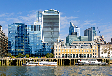 Historic architecture Old Billingsgate fish market building contrast with modern skyscrapers, River Thames, City of London, England, UK