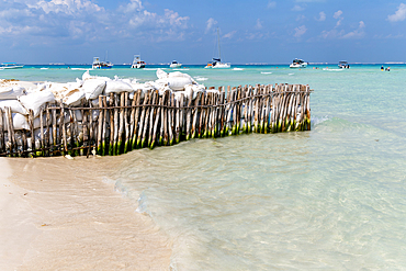 Groyne on sand beach to trap sediment, Playa Norte, Isla Mujeres, Caribbean Coast, Cancun, Quintana Roo, Mexico, North America