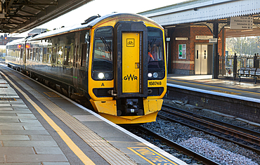 GWR British Rail Class BR Class 158 diesel multiple unit train arriving at platform, Westbury, Wiltshire, England, UK