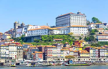 Historic riverside buildings on hillside of Ribeira next to River Douro, Porto, Portugal, Europe