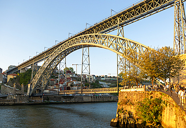 Golden hour at Dom Luis I Bridge crossing River Douro from Vila Nova de Gaia, Porto, Portugal, Europe 1886
