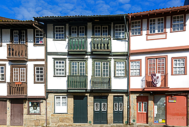 Historic buildings in Praça de São Tiago, city of Guimaraes, northern Portugal, Europe