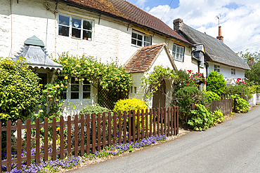 Attractive historic cottages in village of Avebury, Wiltshire, England, UK
