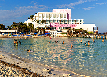 People bathing in lagoon at Mia Reef Hotel, Isla Mujeres, Caribbean Coast, Cancun, Quintana Roo, Mexico, North America