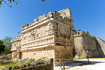 Elaborate decorated stone facade in Monjas complex, iglesia (church) building, Chichen Itza, UNESCO World Heritage Site, Yucatan, Mexico, North America