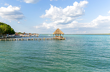 Cabana thatched cabin on wooden jetty Lake Bacalar, Bacalar, Quintana Roo, Yucatan Peninsula, Mexico, North America