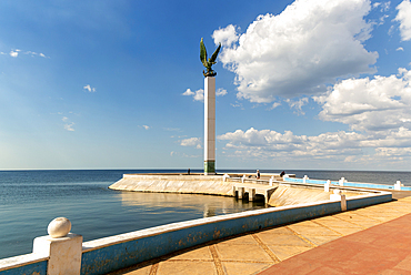 Sculpture of winged Mayan Angel on tall column, the seafront Malecon, Campeche city, Campeche State, Mexico, North America