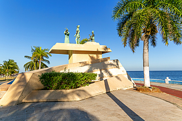 Artwork sculpture of priest with Spanish soldier and Mayan person, Malecon, Campeche city, Campeche State, Mexico, North America