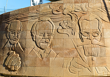 Faces of historic figures, Independence monument in Barrio San Roman, Campeche city, Campeche State, Mexico, North America