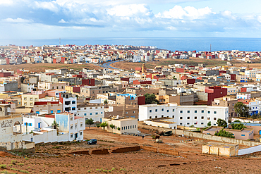 Oblique view over coastal town to Atlantic Ocean, Mirleft, southern Morocco, North Africa, Africa