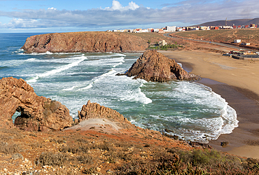 Beach with rocky outrcop and coastline in bay, Plage Sidi Mohammed Ben Abdellah, Mirleft, Morocco, North Africa, Africa