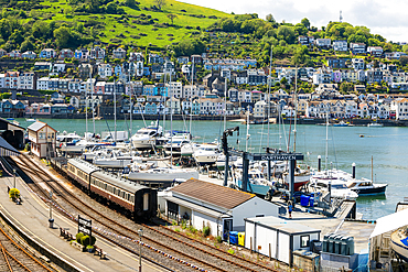 View across Kingswear railway station and River Dart estuary to Dartmouth, Devon, England, United Kingdom, Europe