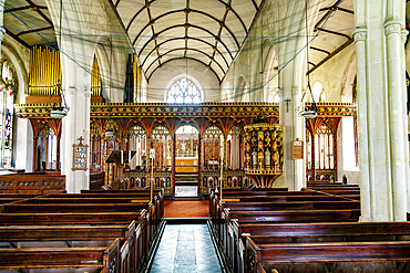 View from nave to rood screen inside village parish church of Saint Andrew, Harberton, south Devon, England, United Kingdom, Europe