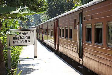 Train at station platform, Mirissa, Matara District, Southern Province, Sri Lanka, Asia