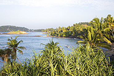 Tropical landscape of palm trees and blue Indian Ocean, Mirissa, Sri Lanka, Asia