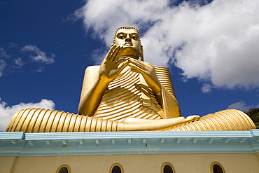 Giant Golden Buddha statue at Dambulla cave temple complex, UNESCO World Heritage Site, Sri Lanka, Asia