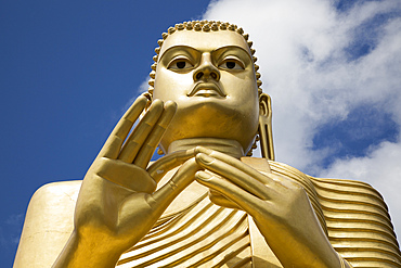 Giant Golden Buddha statue at Dambulla cave temple complex, UNESCO World Heritage Site, Sri Lanka, Asia