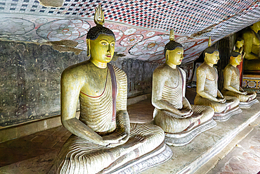 Buddha figures inside Dambulla cave Buddhist temple complex, UNESCO World Heritage Site, Sri Lanka, Asia