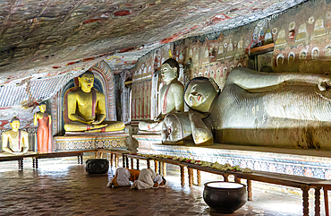 Buddha figures inside Dambulla cave Buddhist temple complex, UNESCO World Heritage Site, Sri Lanka, Asia