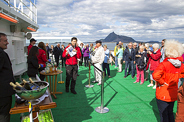 Celebration crossing the Arctic Circle heading south, on Hurtigruten ferry, Norway, Scandinavia, Europe