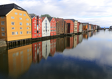 Historic waterside warehouse buildings on River Nidelva, Bryggene, Trondheim, Norway, Scandinavia, Europe