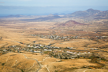 View of land and villages in barren interior of Fuerteventura, Canary Islands, Spain, Atlantic, Europe