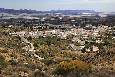 View over village houses and plastic farming in the valley from Nijar, Almeria, Andalusia, Spain, Europe