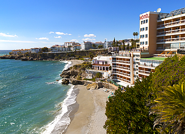 Playa Caletilla sandy beach at popular holiday resort town of Nerja, Malaga province, Andalusia, Spain, Europe