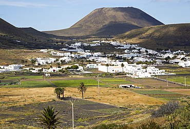 View over whitewashed houses to Monte Corona volcano cone, village of Maguez, Lanzarote, Canary Islands, Spain, Atlantic, Europe