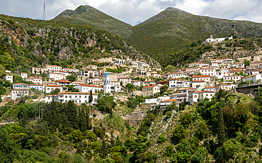 View of whitewashed buildings on mountainside, village of Dhermi, Albania, Europe