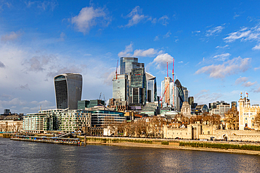 London skyline with modern buildings and blue sky, viewed from across the River Thames, London, England, United Kingdom, Europe