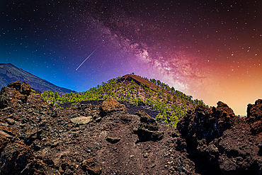 Starry night sky over a volcanic landscape with a colorful twilight gradient in Tenerife, Canary Islands, Spain, Atlantic, Europe