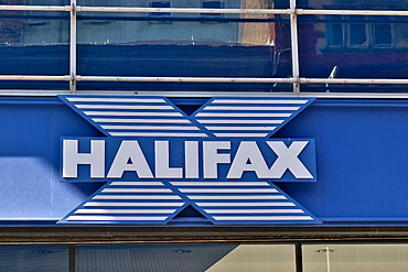 Image displays the Halifax bank logo, featuring an 'X' with white stripes, set against a blue background, and the word 'HALIFAX' in white letters in Liverpool, UK.