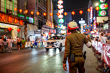 Bangkok, Thailand - February 26, 2026: Traffic Police officer seen on Yaowarat Road, Chinatown, Bangkok, Thailand.