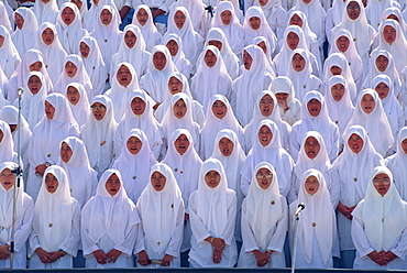 Women in white during the National Day celebrations in the Bandar Seri Begawan stadium in Brunei, Borneo, Southeast Asia, Asia
