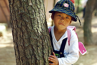 Portrait of a young school child in Pusan City, Korea, Asia