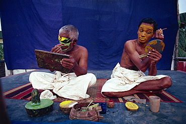 Kathakali performers applying make-up, Cochin, Kerala state, India, Asia