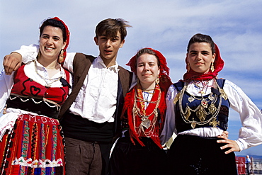 Four people in traditional costume, Festa de Santo Antonio (Lisbon Festival), Lisbon, Portugal, Europe