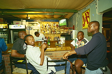 Hanging out at a sheebeen in the Fundani township in Port Elizabeth, South Africa, Africa