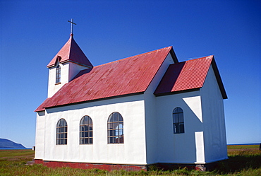 Church with white walls and corrugated roof at Flatey, north Iceland, Polar Regions