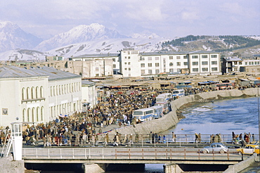 Crowds of people and buses in the city, Kabul, Afghanistan