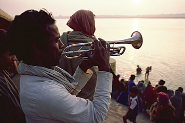 Musicians herald the rising of Lord Surya (sun god), Sun Worship Festival, Varanasi, Uttar Pradesh state, India, Asia