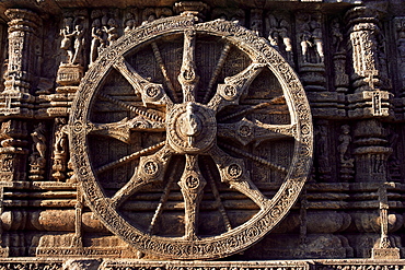 Close-up of carved chariot wheel, Sun Temple dedicated to the Hindu sun god Surya, Konarak, UNESCO World Heritage Site, Orissa state, India, Asia