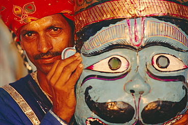Actor and mask from the Ramlilla, the stage play of the Hindu Epic the Ramayana, Varanasi (Benares), Uttar Pradesh State, India